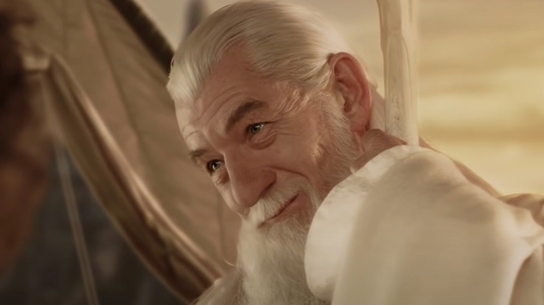 Gandalf leans on his staff