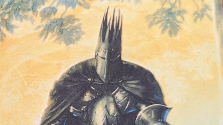 Close up of Morgoth holding a sword