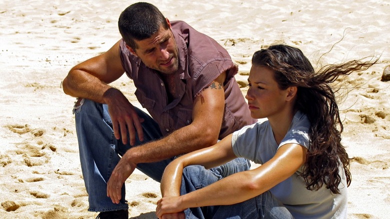 Jack and Kate sitting on beach