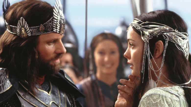 Aragorn touching Arwen's chin