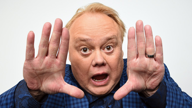 Louie Anderson framing face