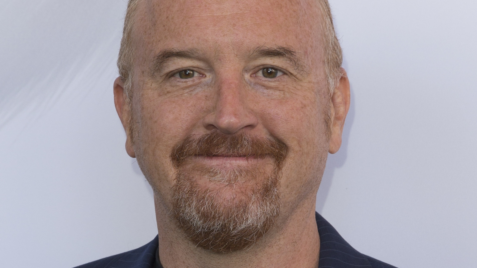 Louis C.K.'s Hilarious SNL Slip-Up Was Due To A Simple Cue Card Mistake