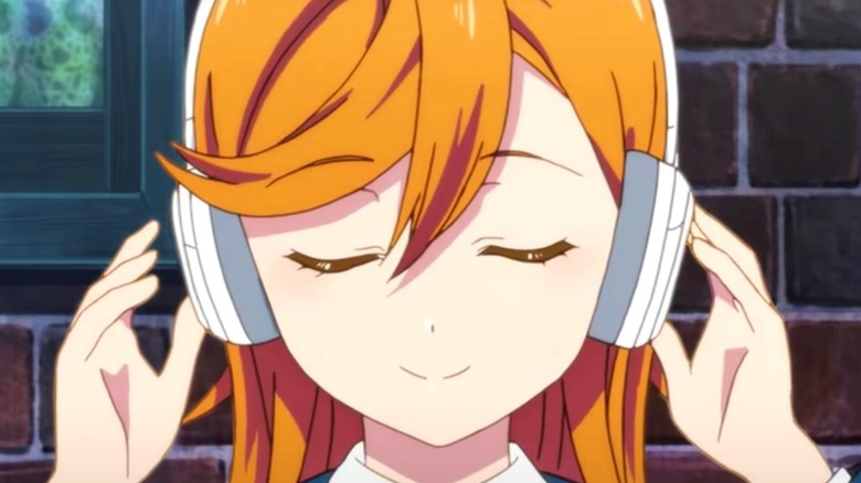 Kanon Shibuya listening with headphones