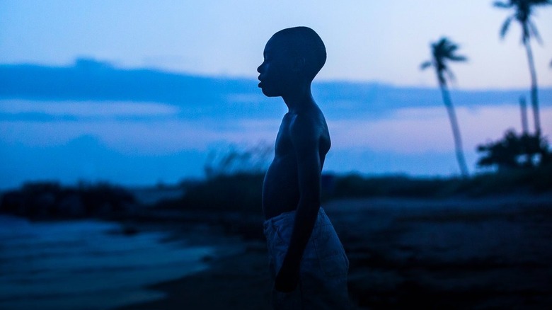 Little stands on the beach in "Moonlight" (2016)