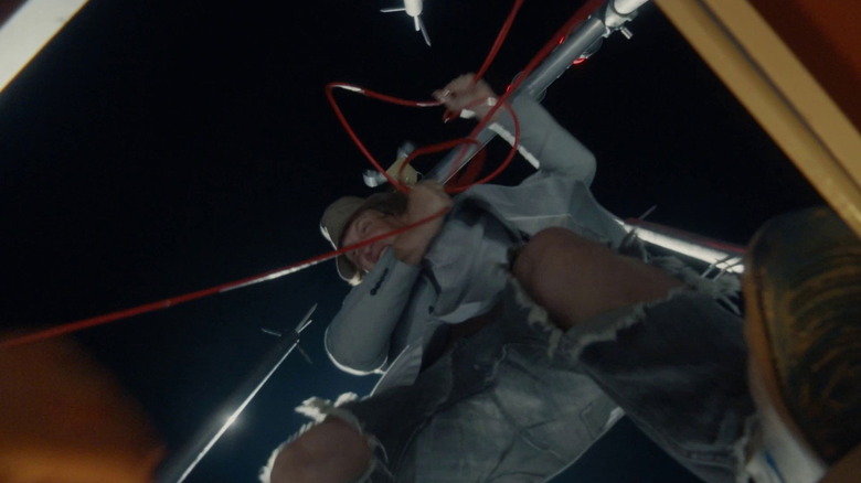 Matt pulls on a bungie cord atop the CN Tower in "Nirvanna the Band the Show the Movie" (2026)