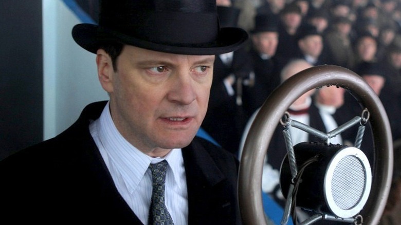 Colin Firth as George VI at microphone in The King's Speech