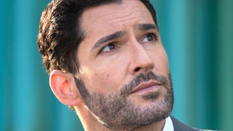 Tom Ellis looking up