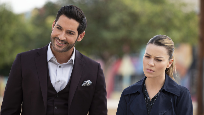 Lucifer smiling while Decker frowns