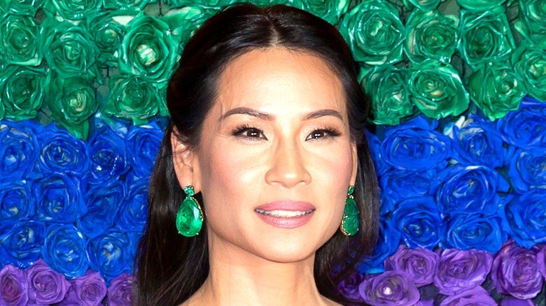 Lucy Liu poses at event 