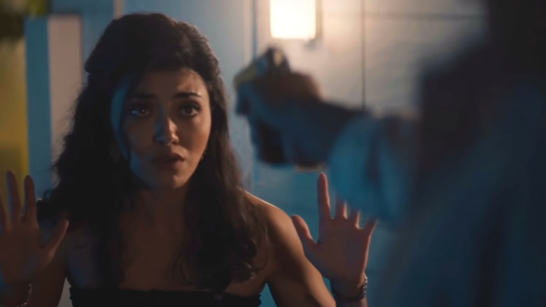 Lucy with her hands up