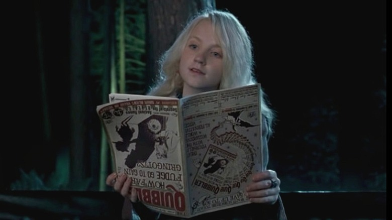 Luna staring at Harry