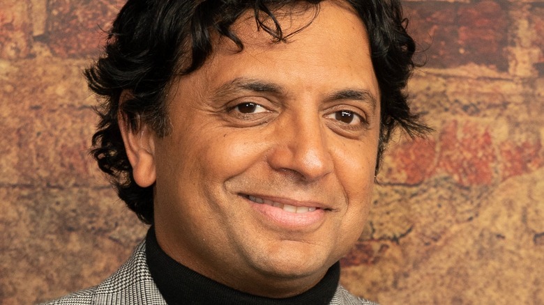 M. Night Shyamalan smiling