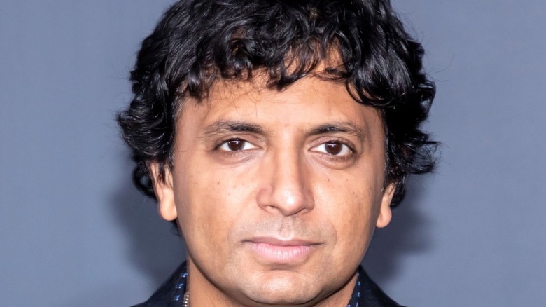 M. Night Shyamalan posing