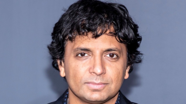 M. Night Shyamalan posing