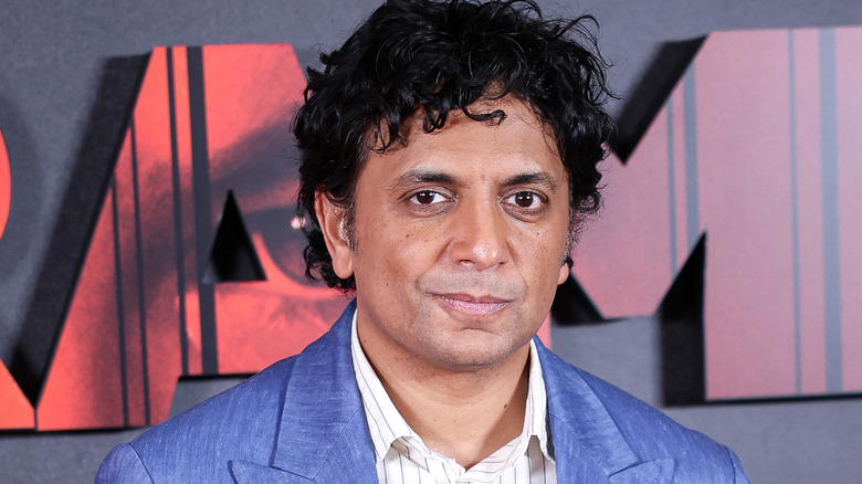 M. Night Shyamalan posing