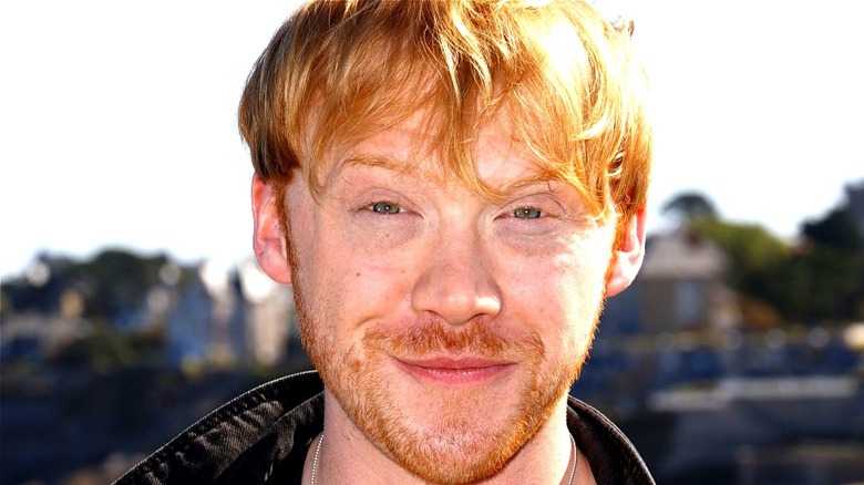 Rupert Grint looking towards the sun