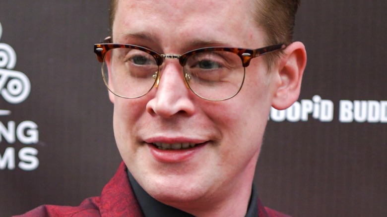 Macaulay Culkin smiling