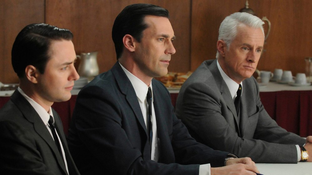 Vincent Kartheiser, Jon Hamm, and John Slattery as Pete Campbell, Don Draper, and Roger Sterling on Mad Men