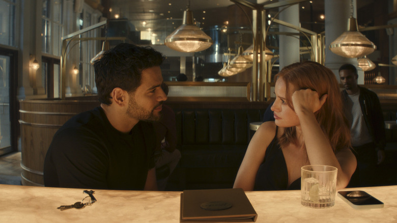 Beau and Charlie looking each other at a bar in Maintenance Required