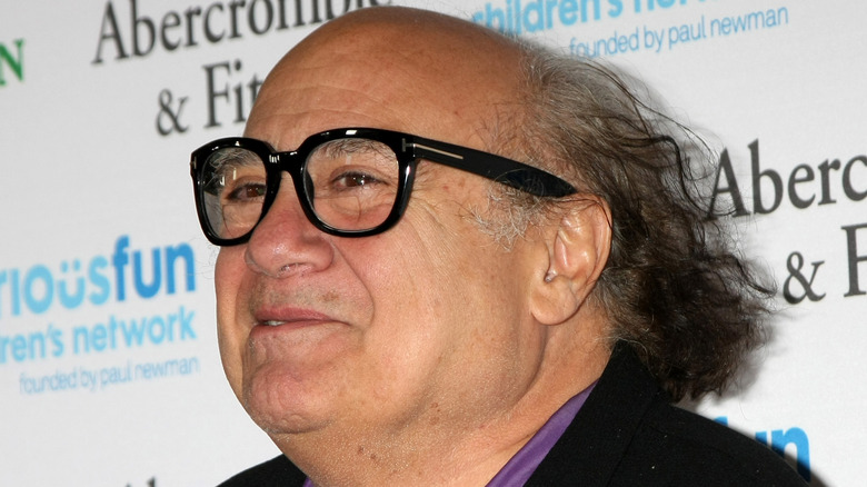 Danny DeVito looking on
