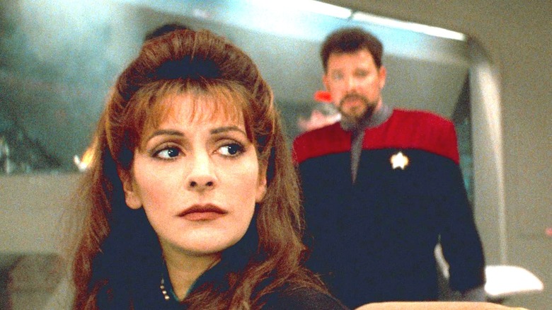 Troi looking alarmed