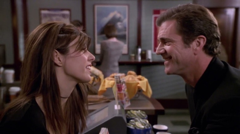 Marisa Tomei and Mel Gibson in bed in What Women Want