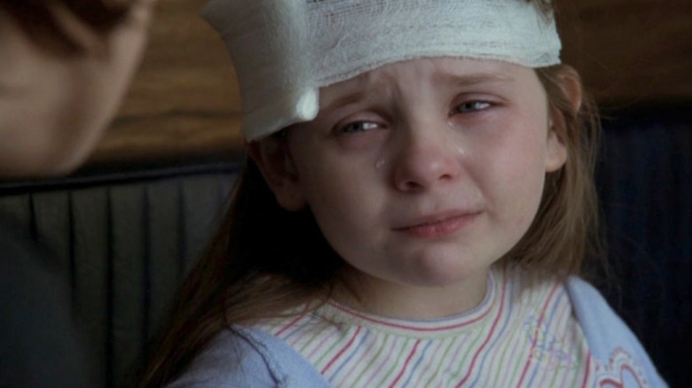 Patty with a bandage on her head crying in Law & Order: Special Victims Unit