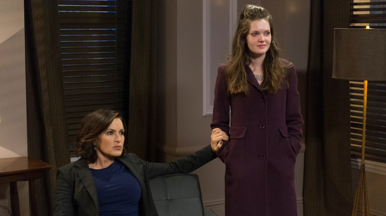 Olivia holding Jenny's arm in an office on Law & Order: Special Victims Unit