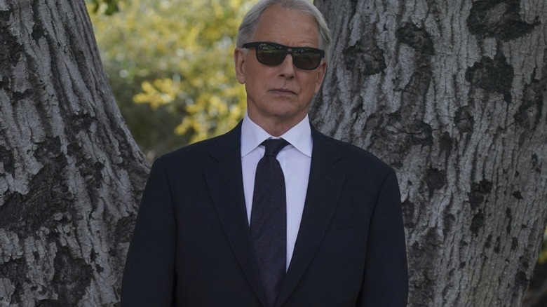 Gibbs wearing suit and sunglasses