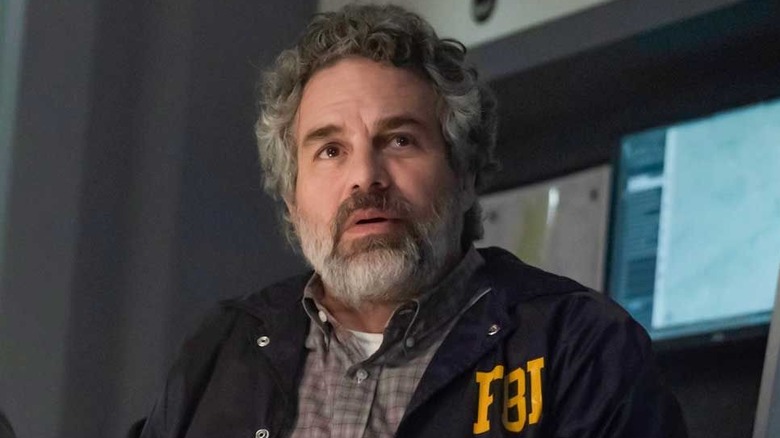 Tom Brandis wearing his FBI jacket in Task (2025)