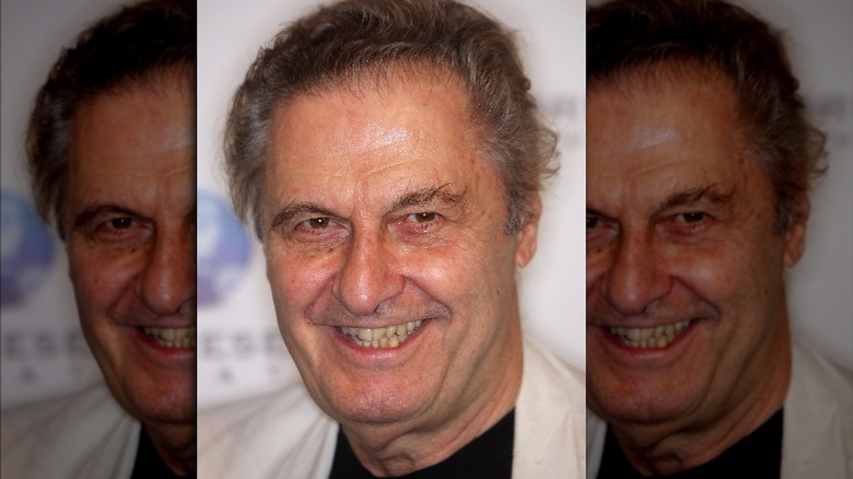 Joseph Bologna grins