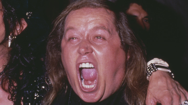 Sam Kinison screams