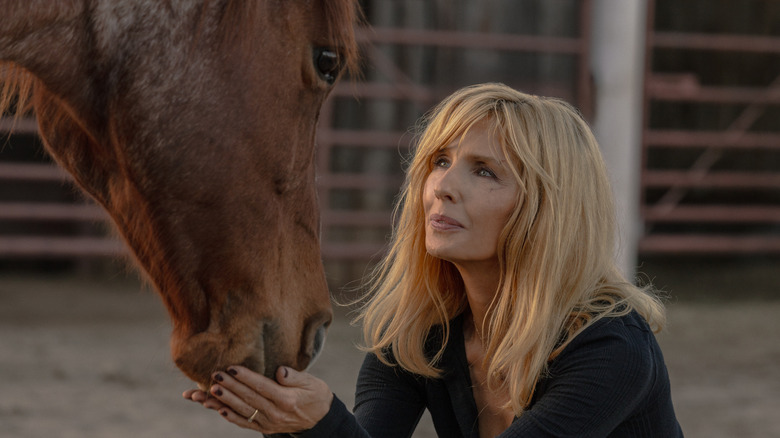 Beth Dutton smiles up at a horse in "Dutton Ranch" (2026)