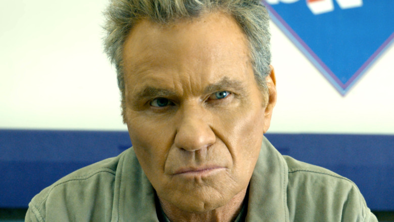 Martin Kove as John Kreese scowling