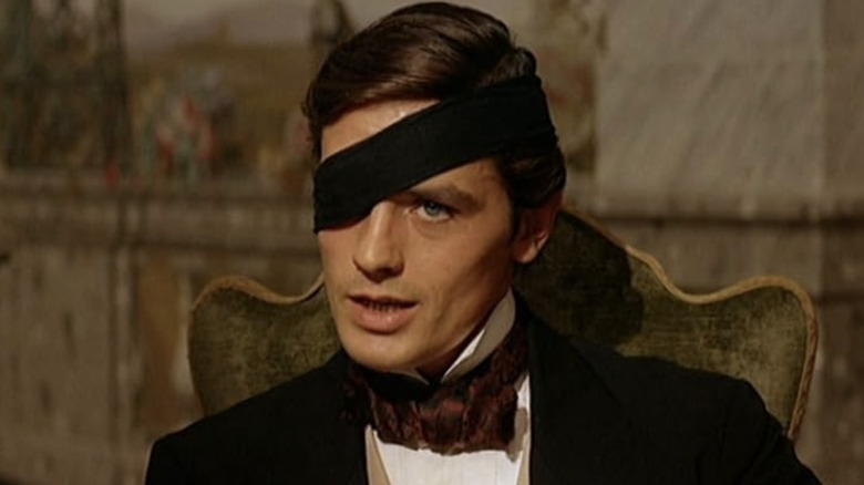 Prince Tancredi Falconeri with one eye covered in 