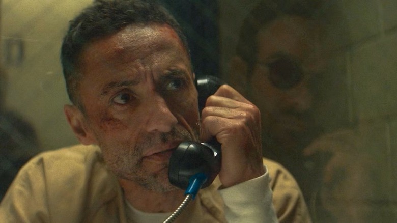 Hector talks to Matt on phone through glass on Daredevil: Born Again (2025)