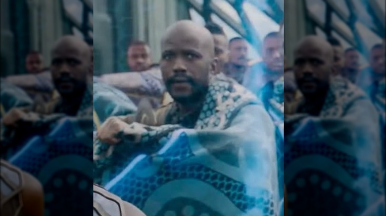 A tribe warrior in blue from Black Panther: Wakanda Forever