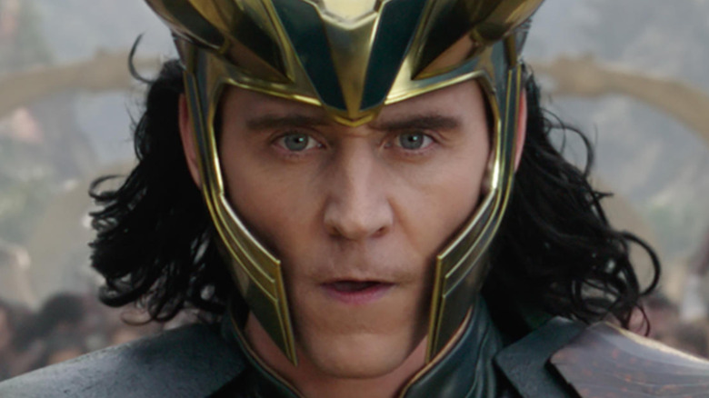 Tom Hiddleston as Loki with horned helmet