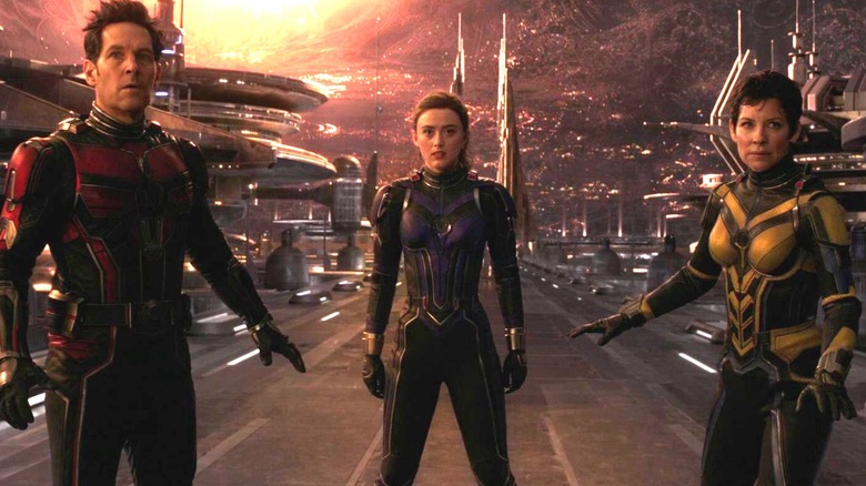 Ant-Man, Cassandra, and Wasp standing in the Quantum Realm in "Ant-Man and the Wasp: Quantumania" (2023)