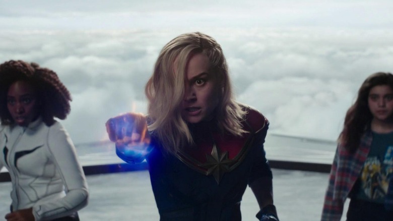 Monica Rambeau, Captain Marvel, and Ms. Marvel standing together in "The Marvels" (2023)