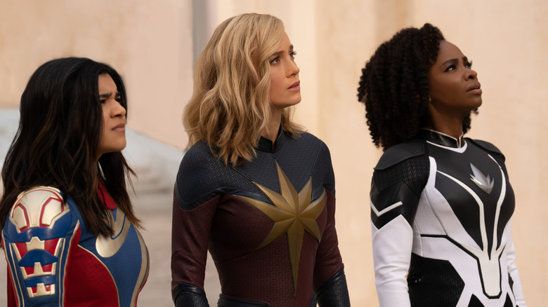 Ms. Marvel, Captain Marvel, and Monica Rambeau standing together in "The Marvels" (2023)