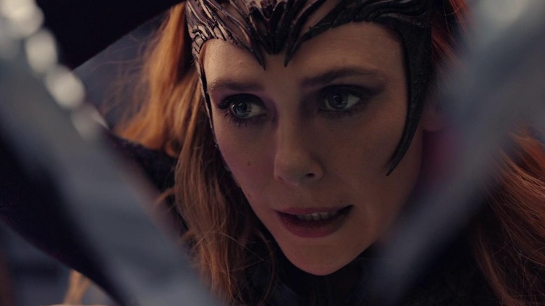 Wanda Maximoff terrifyingly emerging from a mirror in "Doctor Strange in the Multiverse of Madness" (2022)