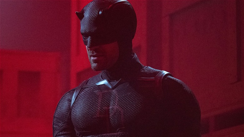 Daredevil standing in a red room on 