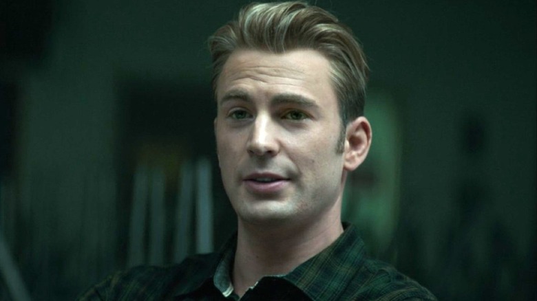 Steve Rogers sitting in meeting