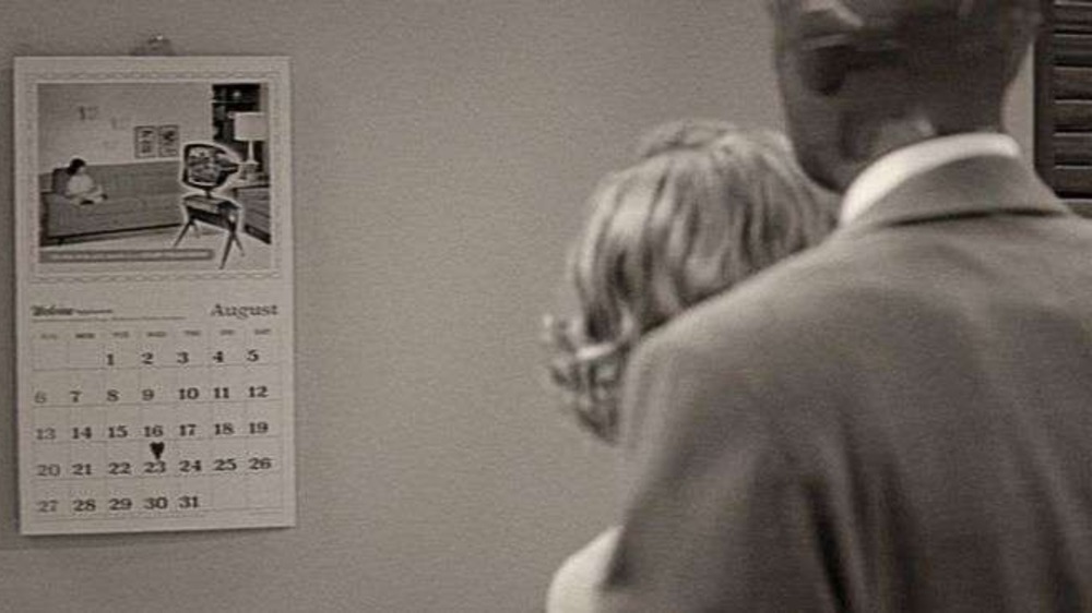 Wanda and Vision stare at a calendar on WandaVision