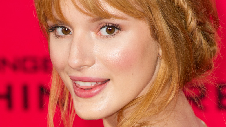 Bella Thorne smiles