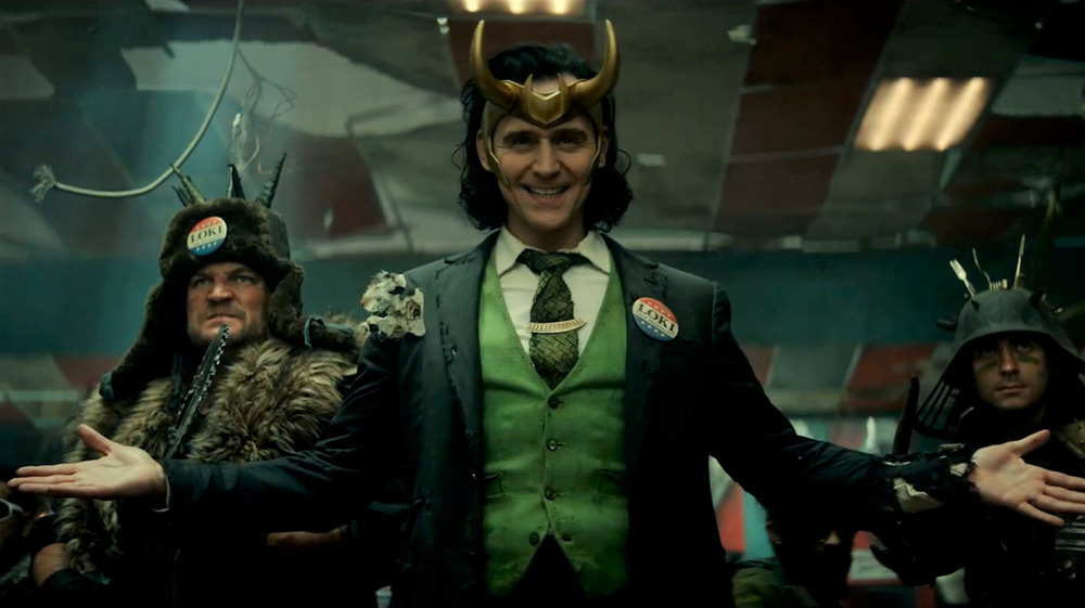 Loki grinning and spreading hands