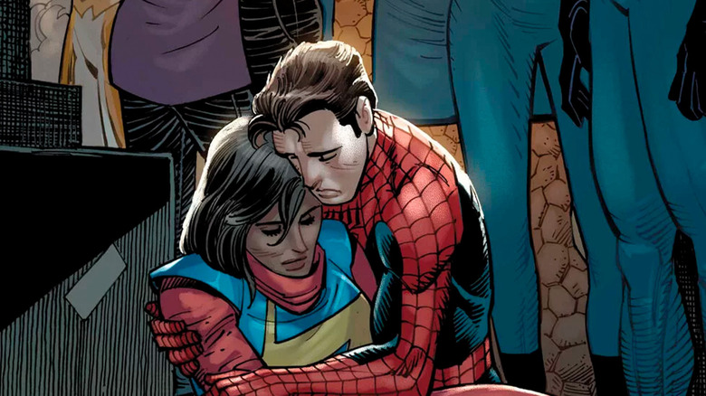 Spider-Man holds a deceased Ms. Marvel