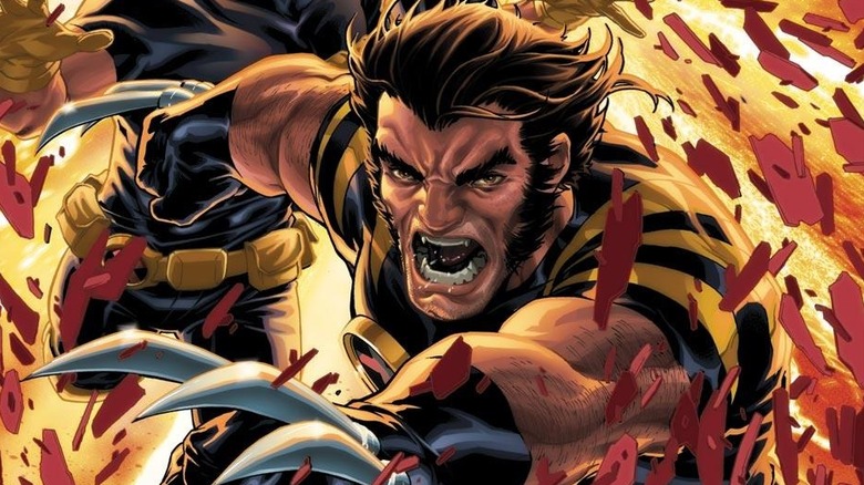 Wolverine slicing through red shards with flames behind him