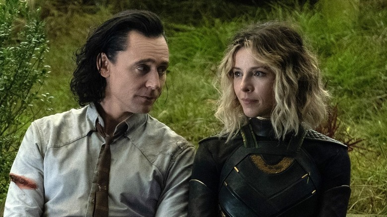Loki and Sylvie sitting down